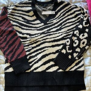NWT funky Sanctuary Brand sweater. Size Med